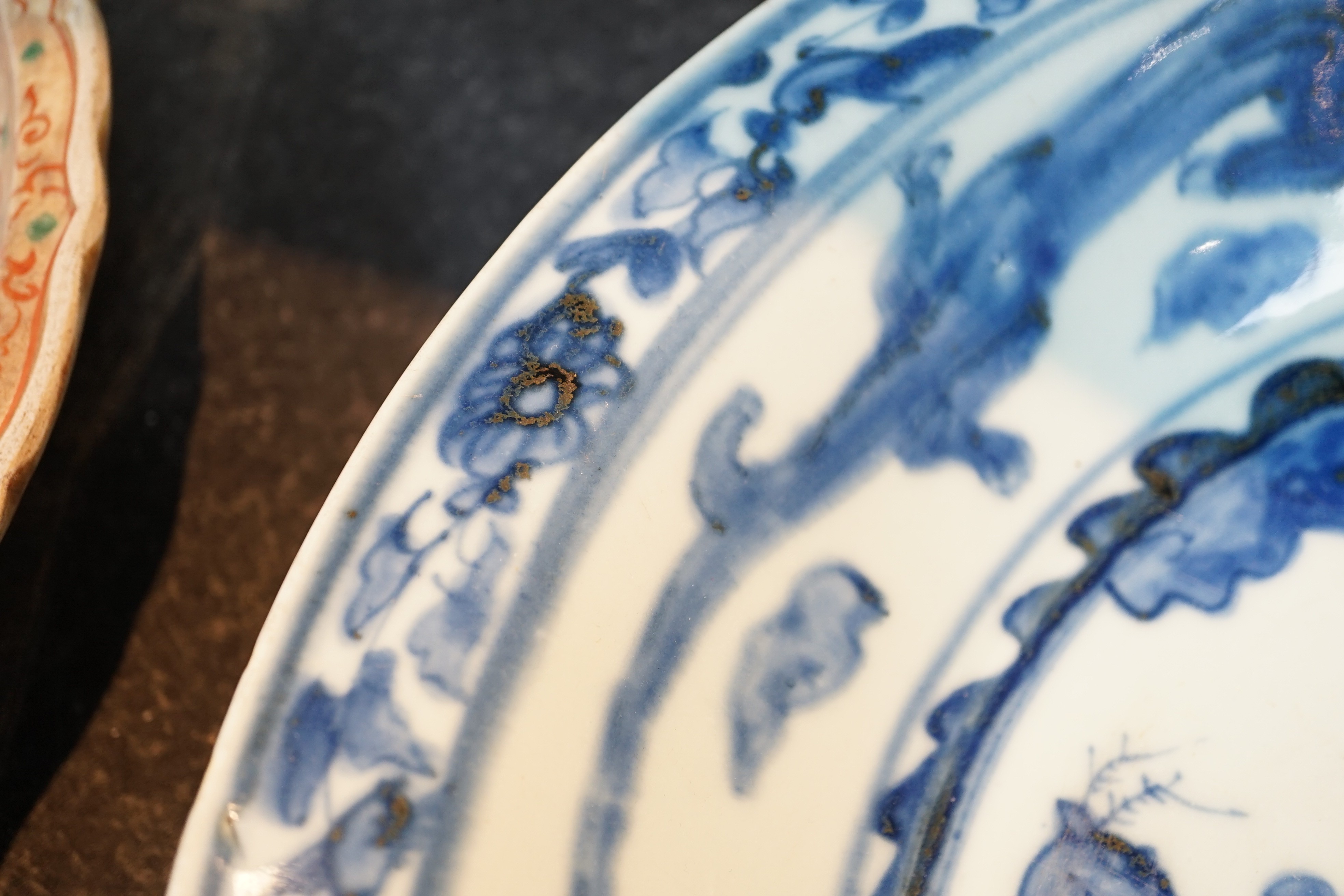 A large Chinese Swatow blue and white ‘Shou Lao’ dish, Zhangzhou kilns, Wanli period, 43.4cm diameter, tiny rim chip